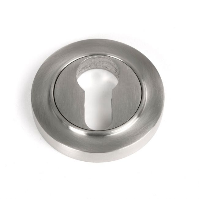 The Round Concealed Euro Keyhole Escutcheon in Satin Stainless Steel Shown on a White Background