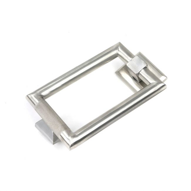 The Satin Stainless Steel Modern Knurled Rectangular Door Knocker on a White Background The Satin Stainless Steel Modern Knurled Rectangular Door Knocker on a White Background