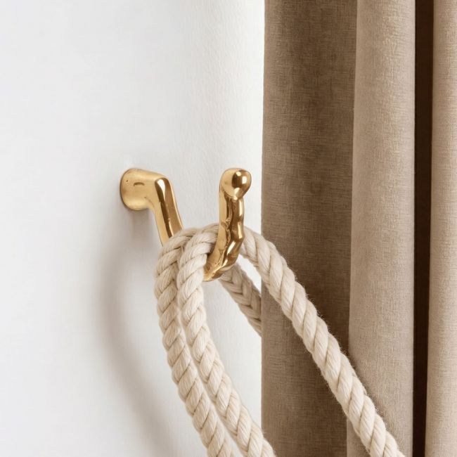 The Scalloped curtain tie back Fitted on a White Painted Living Room Wall - Digital Illustration The Scalloped curtain tie back Fitted on a White Painted Living Room Wall - Digital Illustration