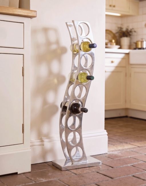 The “Serena” Aluminium Curved Wine and Bottle Holder Shown Supporting some Wine Bottles in a Traditional Country Kitchen - Digital Illustration 
