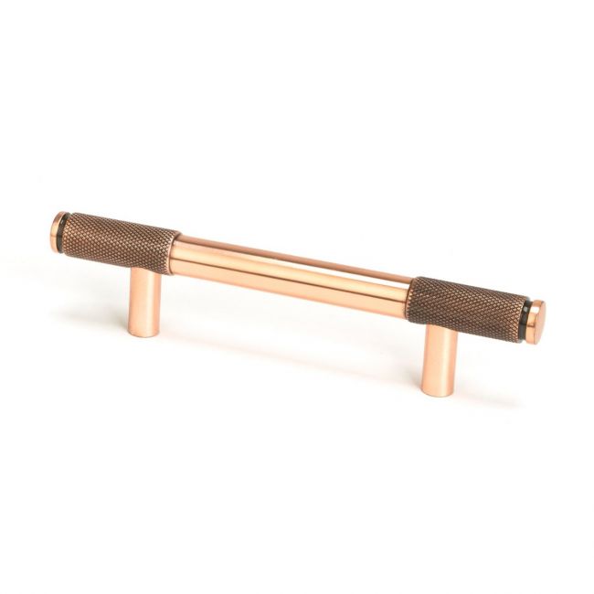 The Small Half Knurled Cabinet Pull Handle in Polished Bronze Shown Upright on a White Background The Small Half Knurled Cabinet Pull Handle in Polished Bronze Shown Upright on a White Background