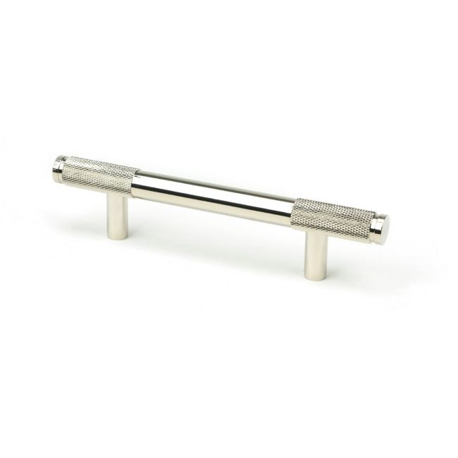 The Small Half Knurled Cabinet Pull Handle in Polished Nickel Shown Upright on a White Background The Small Half Knurled Cabinet Pull Handle in Polished Nickel Shown Upright on a White Background