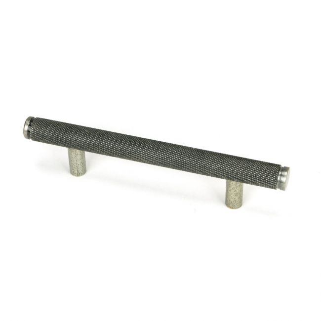 The Small Knurled Cabinet Pull Handle in Pewter Shown Upright on a White Background The Small Knurled Cabinet Pull Handle in Pewter Shown Upright on a White Background