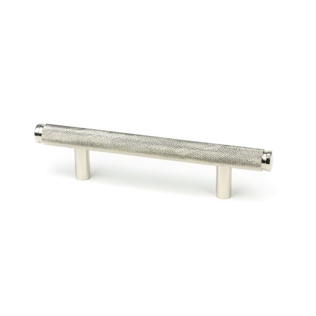 The Small Knurled Cabinet Pull Handle in Polished Nickel Shown Upright on a White Background