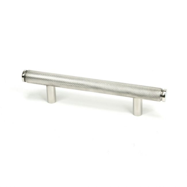 The Small Knurled Cabinet Pull Handle in Polished Stainless Steel Shown Upright on a White Background The Small Knurled Cabinet Pull Handle in Polished Stainless Steel Shown Upright on a White Background