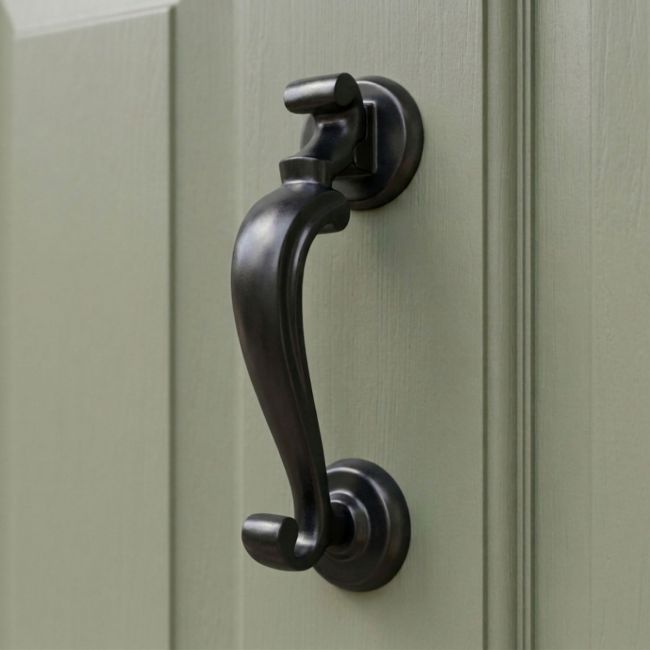 Close-Up of Smooth Black Steel Doctor"s Style Door Knocker - 196mm x 69mm Close-Up of Smooth Black Steel Doctor"s Style Door Knocker - 196mm x 69mm