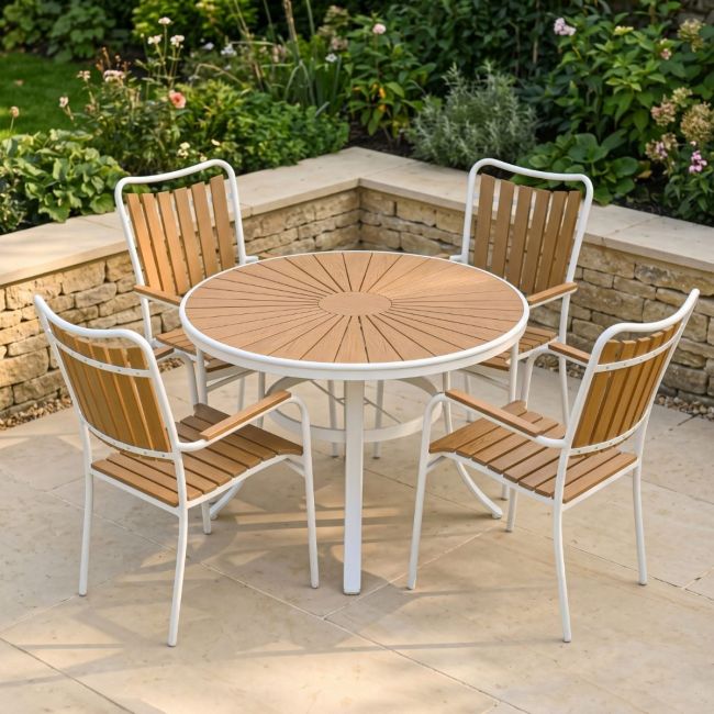 The Solis Round 4-Seater Outdoor Dining Set in White on a Sunny Patio in a Low walled Garden - Digital Illustration