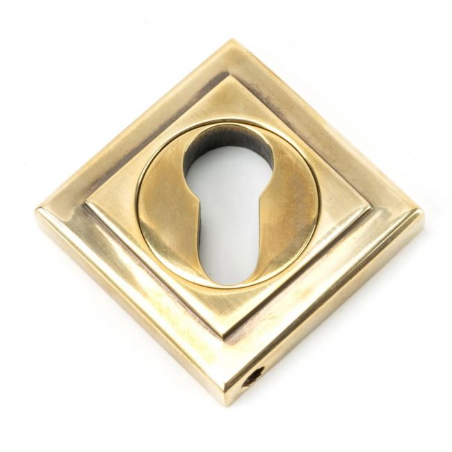 The Square Concealed Standard Euro Escutcheon - Aged Brass in a Diamond Orientation The Square Concealed Standard Euro Escutcheon - Aged Brass in a Diamond Orientation
