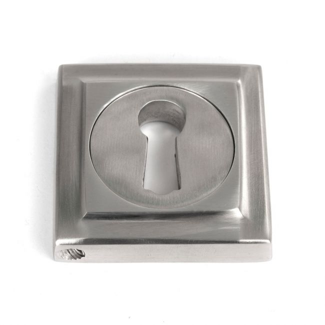 The Square Concealed Standard Keyhole Escutcheon in Satin Stainless Steel Shown on a White Background