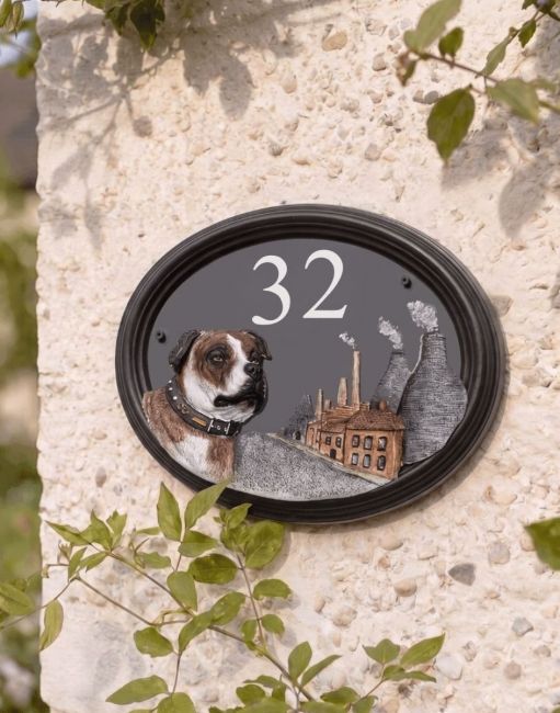 A Number 32 Staffordshire Bull Terrier House Number Sign in a Hand Painted Finish Mounted on a Cream Coloured Cottage Wall - Digital Illustration A Number 32 Staffordshire Bull Terrier House Number Sign in a Hand Painted Finish Mounted on a Cream Coloured Cottage Wall - Digital Illustration
