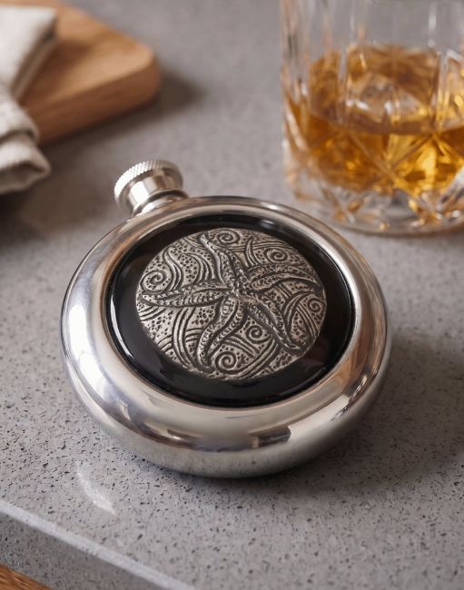 The Starfish Whiskey Flask on a Grey Kitchen Counter next to a Glass of Whiskey - Digital Illustration