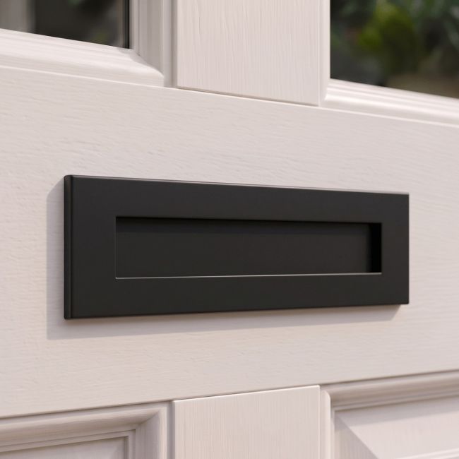 The Traditional 12 Inch Front Door Letter Plate - Antique Period Style Flap in a Matt Black Finish Shown from Behind The Traditional 12 Inch Front Door Letter Plate - Antique Period Style Flap in a Matt Black Finish Shown from Behind