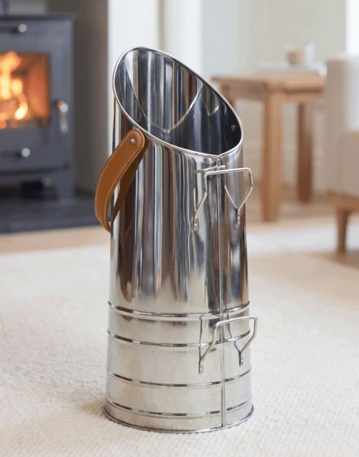 The Traditional "Bromley" Coal Hod With Leather Handle Displayed in a Modern Living Room - Digital Illustration