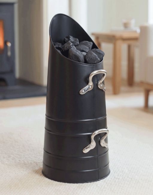 The Traditional "Norfolk" Coal Hod with Nickel Handles in a Modern Living Room with a Fireplace - Digital Illustration The Traditional "Norfolk" Coal Hod with Nickel Handles in a Modern Living Room with a Fireplace - Digital Illustration