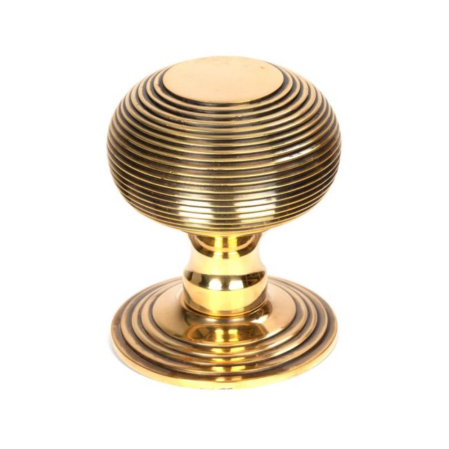 The Traditional Beehive Centre Door Knob on a White Background Shown Upright 