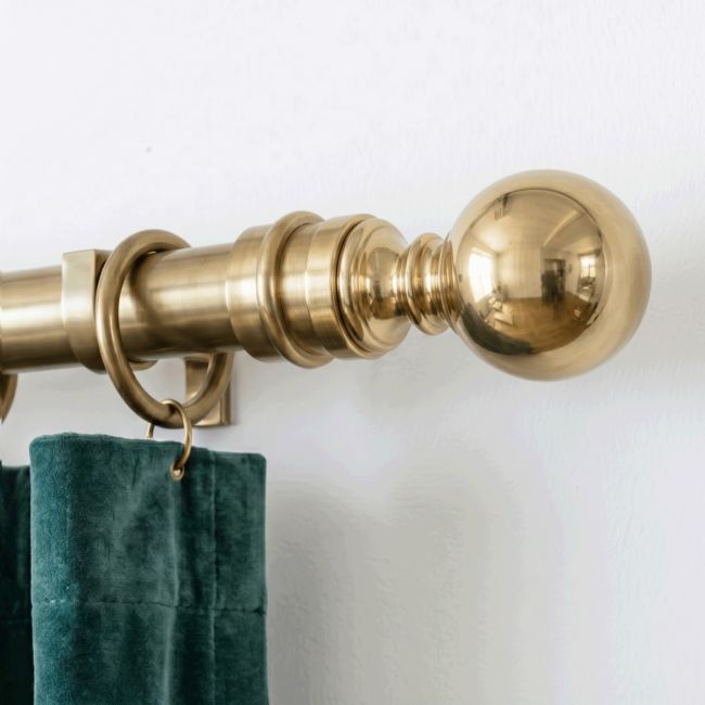 The “Vanderbilt Ball” Curtain Rail Finial Mounted in a Cream Coloured Contemporary Home Shown Close up - Digital Illustration The “Vanderbilt Ball” Curtain Rail Finial Mounted in a Cream Coloured Contemporary Home Shown Close up - Digital Illustration