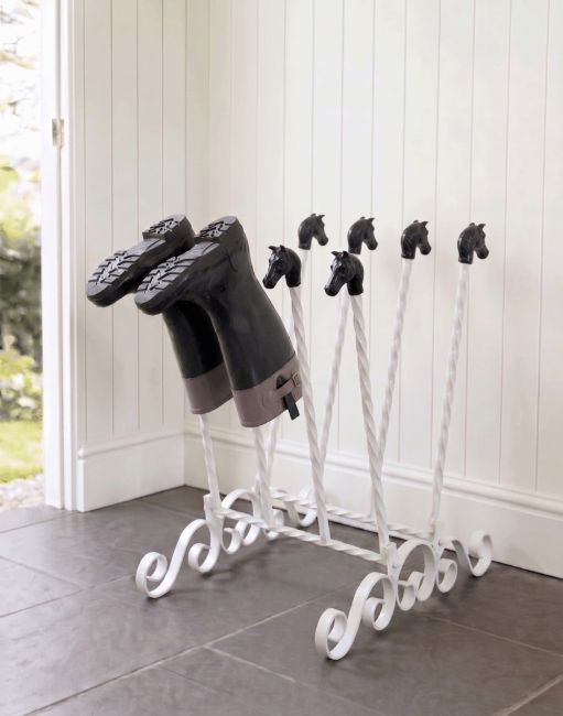 The White Catterick 4 Pair Boot and Welly Rack Mounted on a Stone Tiled Floor in a White Porch Entranceway - Digital Illustration