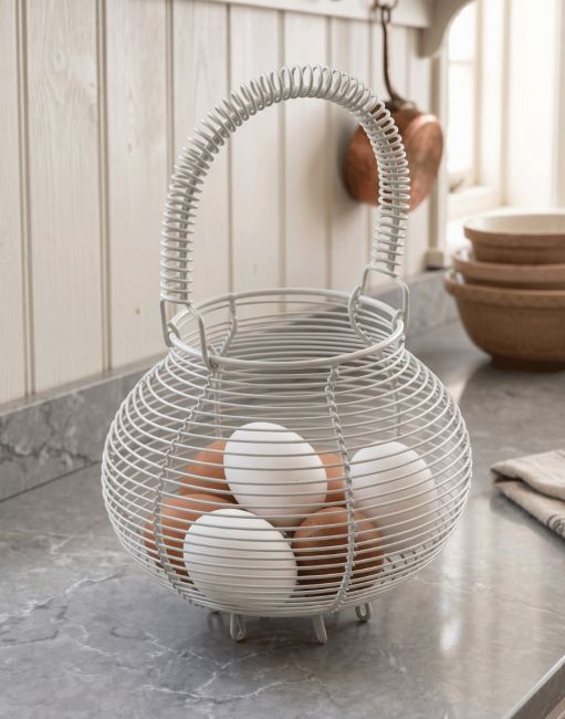 The White Wire Egg Basket with Handle in a Modern Wood Panelled Kitchen - Digital Illustration The White Wire Egg Basket with Handle in a Modern Wood Panelled Kitchen - Digital Illustration