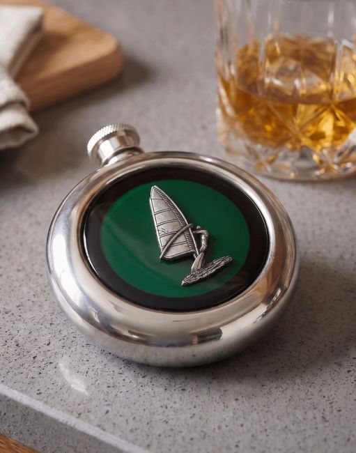 The Wind Surfer Whiskey Flask on a Grey Counter top With a Glass of Whisky - Digital Illustration
