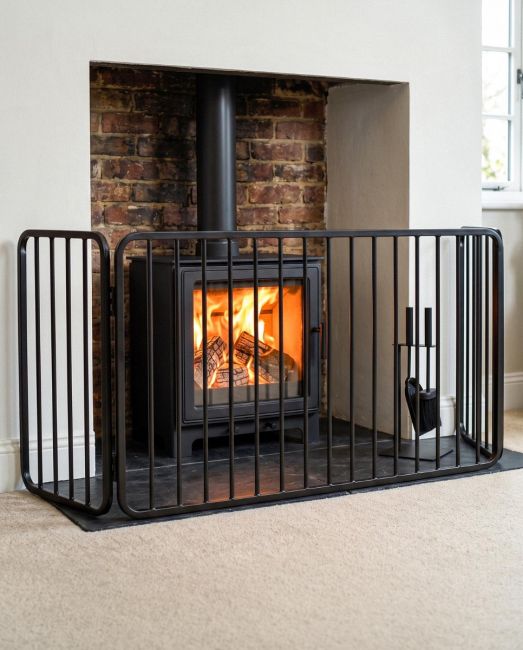 Traditional Large Black Nursery Fire Guard in Situ Traditional Large Black Nursery Fire Guard in Situ