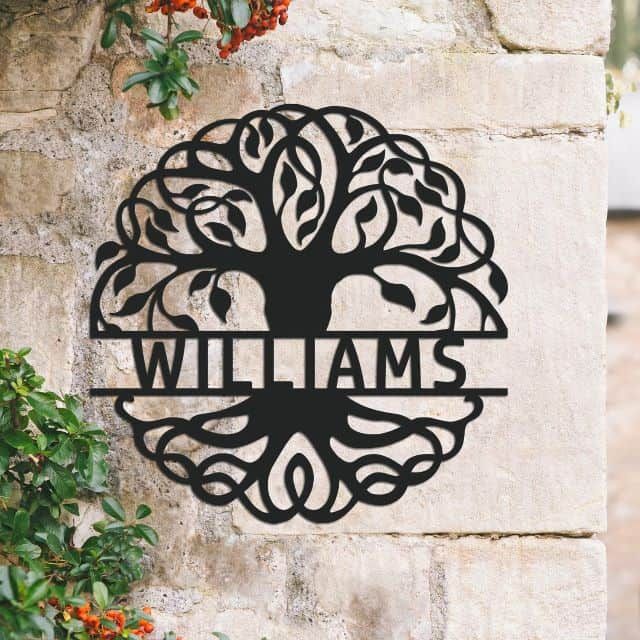 Tree of Life Steel Monogram Steel House Name Sign on situ on a Stone Wall Tree of Life Steel Monogram Steel House Name Sign on situ on a Stone Wall