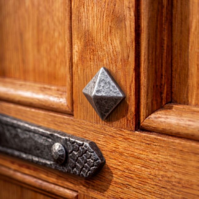 The Large Pewter Pyramid Door Stud on a Heavy Wooden Door - Digital Illustration