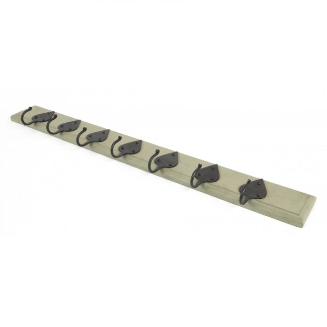 Beeswax Coat Hooks on Olive Green Rack Beeswax Coat Hooks on Olive Green Rack