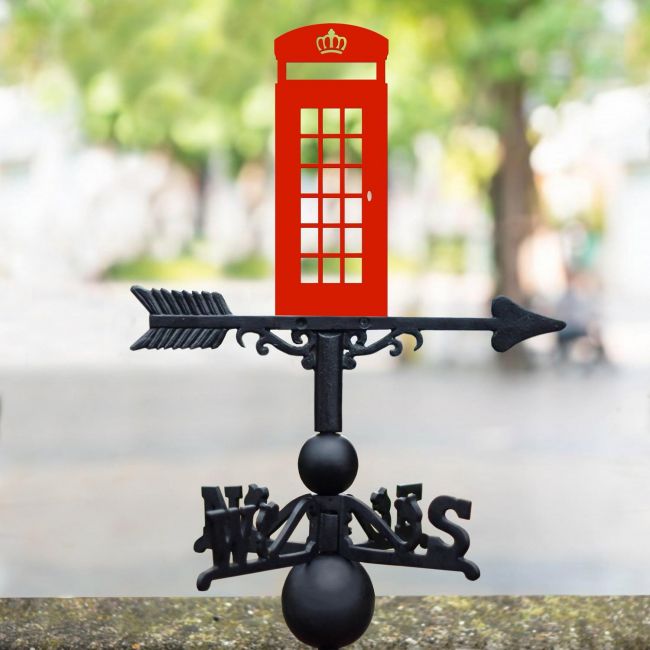 Red Telephone Box Iron Weathervane in the Sunrise Red Telephone Box Iron Weathervane in the Sunrise