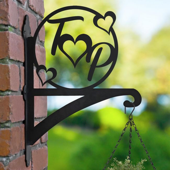 Love Heart Initial Hanging Basket Bracket in Situ on the Side of a House Love Heart Initial Hanging Basket Bracket in Situ on the Side of a House
