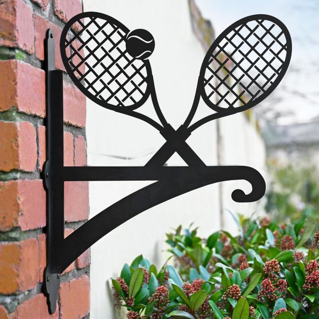 Tennis Racket Hanging Basket Bracket in Situ on the Wall in the Garden Tennis Racket Hanging Basket Bracket in Situ on the Wall in the Garden