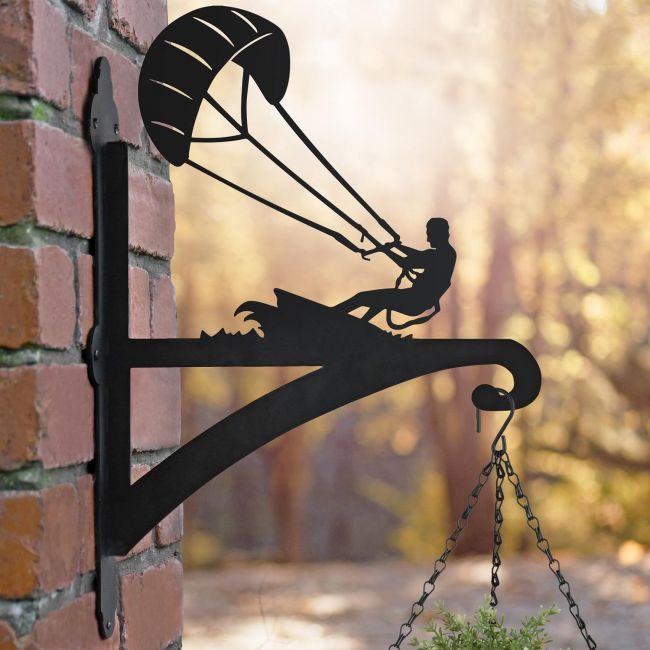 Kite Surfer Hanging Basket Bracket on Wall in Outdoor Space Kite Surfer Hanging Basket Bracket on Wall in Outdoor Space