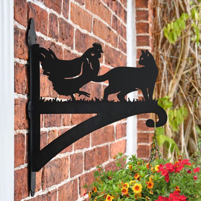 Cat & Chicken Iron Hanging Basket Bracket on a Brick Wall Cat & Chicken Iron Hanging Basket Bracket on a Brick Wall