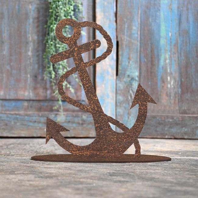 Anchor Rustic Iron Door Stop in Front of a Rustic Blue Door Anchor Rustic Iron Door Stop in Front of a Rustic Blue Door