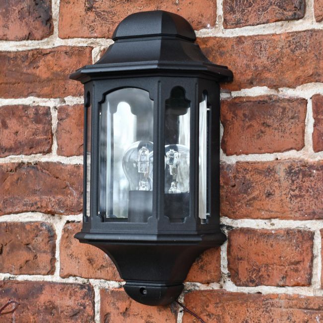 Black Moorside Traditional Flush wall lantern on brick wall Black Moorside Traditional Flush wall lantern on brick wall