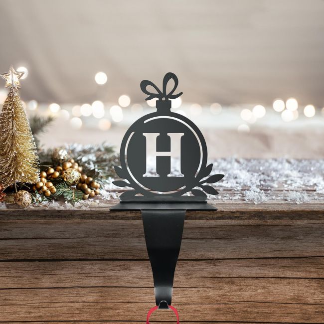 Letter H Stocking Holder in Situ on a Mantel Piece Letter H Stocking Holder in Situ on a Mantel Piece