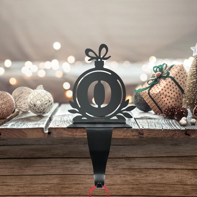Letter O Stocking Holder in Situ on a Mantel Piece  Letter O Stocking Holder in Situ on a Mantel Piece