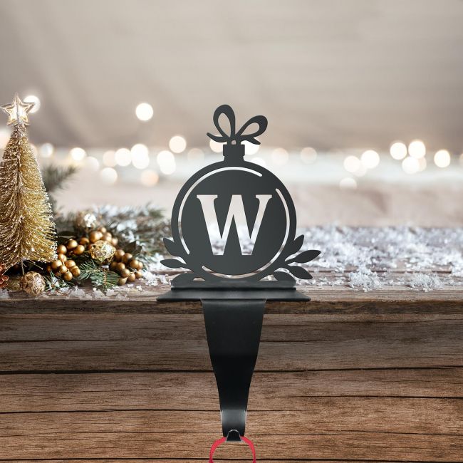 Letter W Stocking Holder in Situ on a Mantel Piece 