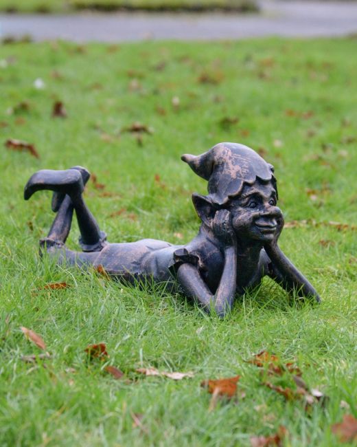 "Reverie" the Pixie Cast Aluminium Garden Sculpture main image lying on grass in verdigris