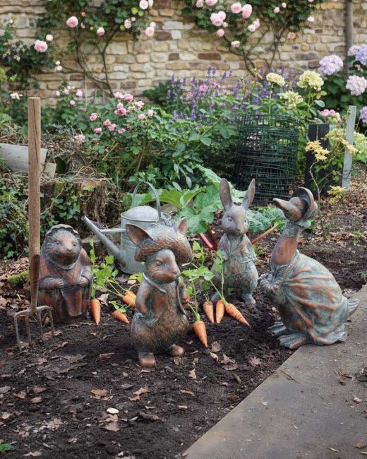 set of Four Peter Rabbit Garden Sculptures Finished in an Aged Bronze
