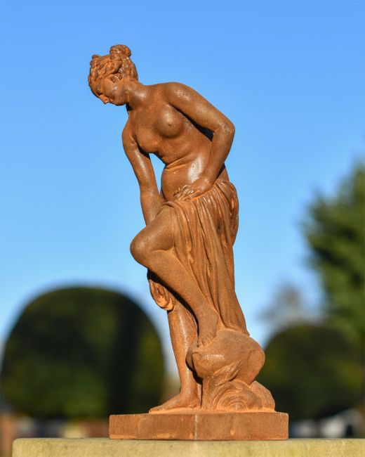 Rustic Cast Iron Woman on Rock Sculpture Rustic Cast Iron Woman on Rock Sculpture