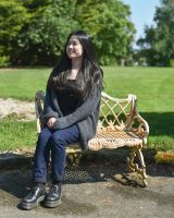 Scale image of rustic champagne cast iron ornate garden bench