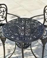 Close up of parasol hole on patio bistro set
