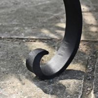 Close-up of the Curled Feet on the Kadai Bowl Close-up of the Curled Feet on the Kadai Bowl