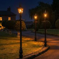 2.25m Harrogate Bright Chrome Lamp Post Illuminated at Night