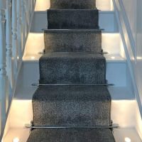 Bright Chrome Acorn Finial Stair Rods in Situ on a Stair Case Bright Chrome Acorn Finial Stair Rods in Situ on a Stair Case