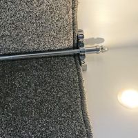 close-up of the Bright Chrome Acorn Finial Stair Rods in Use close-up of the Bright Chrome Acorn Finial Stair Rods in Use