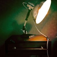 Industrial metal table with bedside lamp