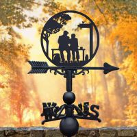 Weathervane featuring lovers on a bench 