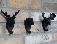Set of Three Black Animal Coat Hooks in Situ