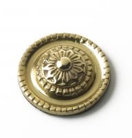 polished brass ornate motif